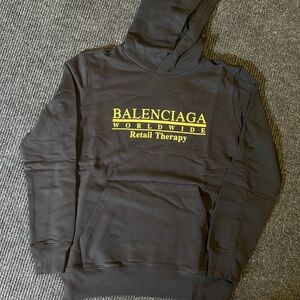Balenciaga ‘Worldwide Retail Therapy’ Black and Yellow hoodie